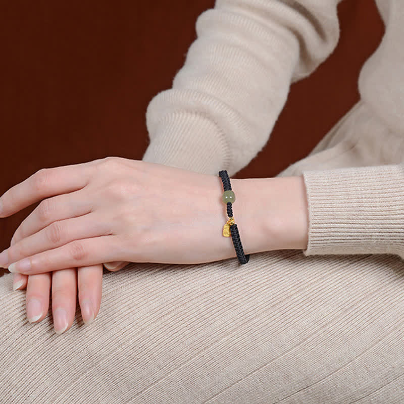 Adjustable 7x8mm Hetian Jade Red String Blessing Bracelet