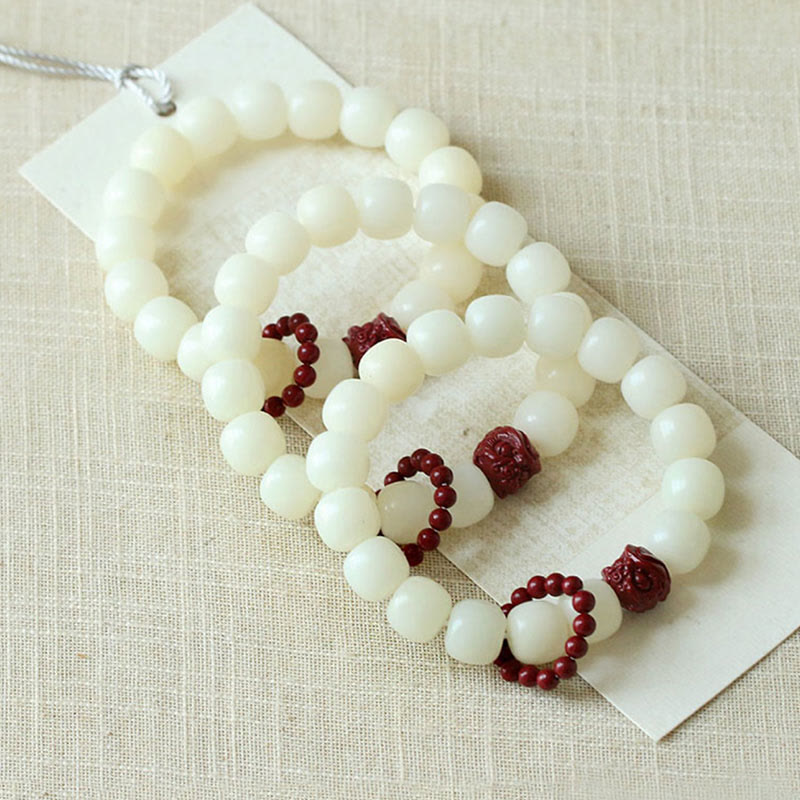 Natural Bodhi Seed Cinnabar Dancing Lion Charm Wrist Mala