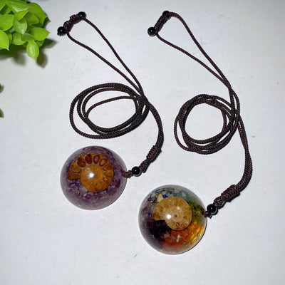 1.6-inch Resin Infused Ammonite Pendant with Amethyst Chips
