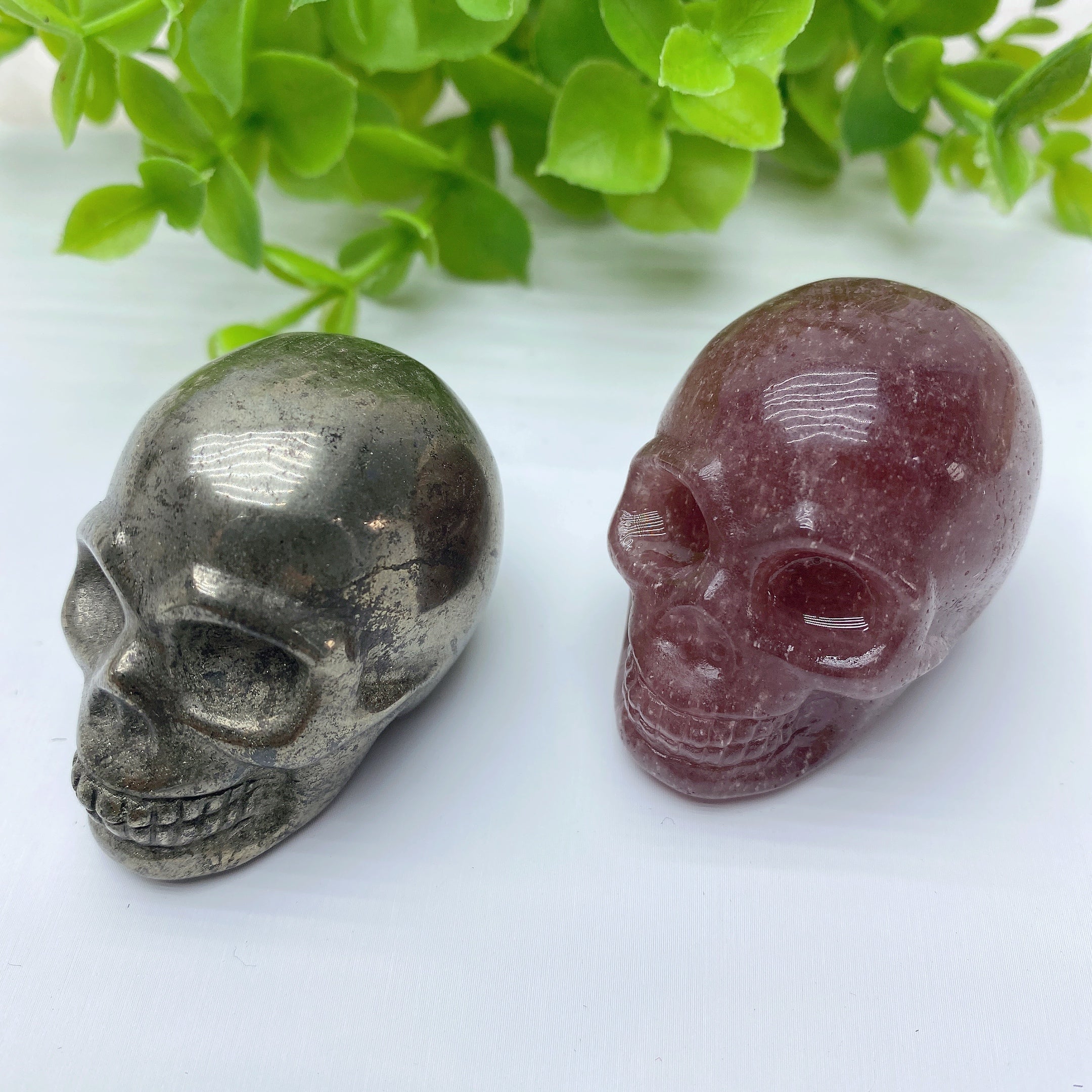 1.85 inch Pyrite & Strawberry Quartz Crystal Skull Carvings