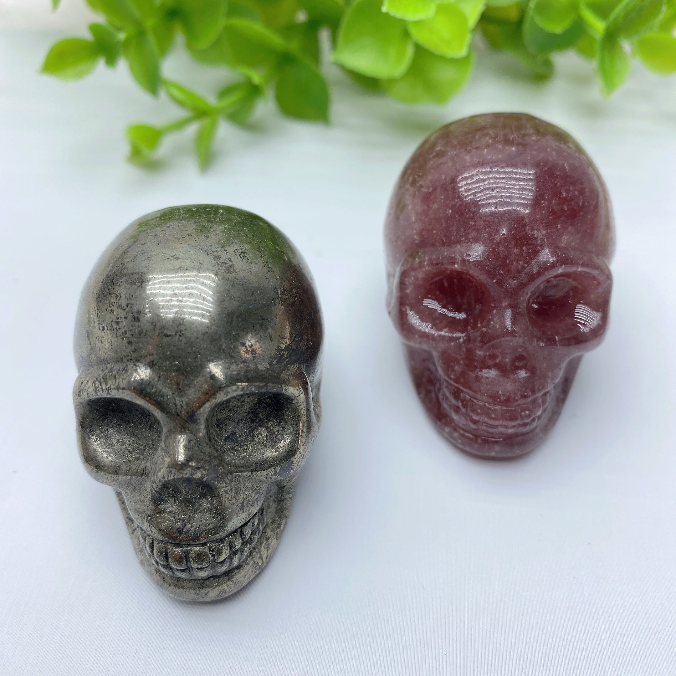 1.85 inch Pyrite & Strawberry Quartz Crystal Skull Carvings
