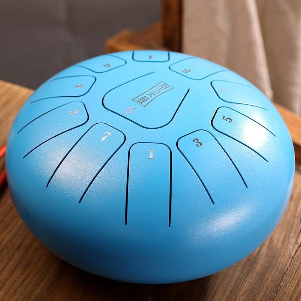 Light blue Carbon Steel Tongue Drum with 11 numbered sections in C Key