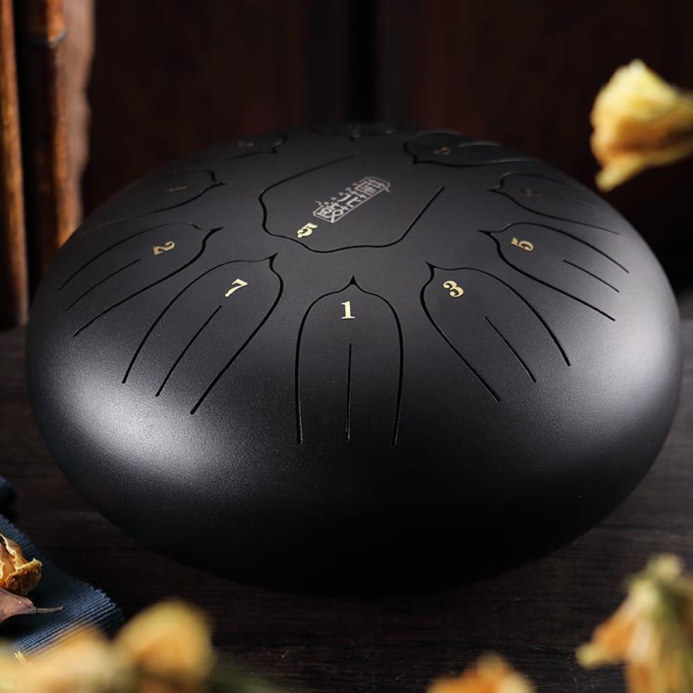 Black steel tongue drum with numbered tone zones, 12-inch, 11-tone C key
