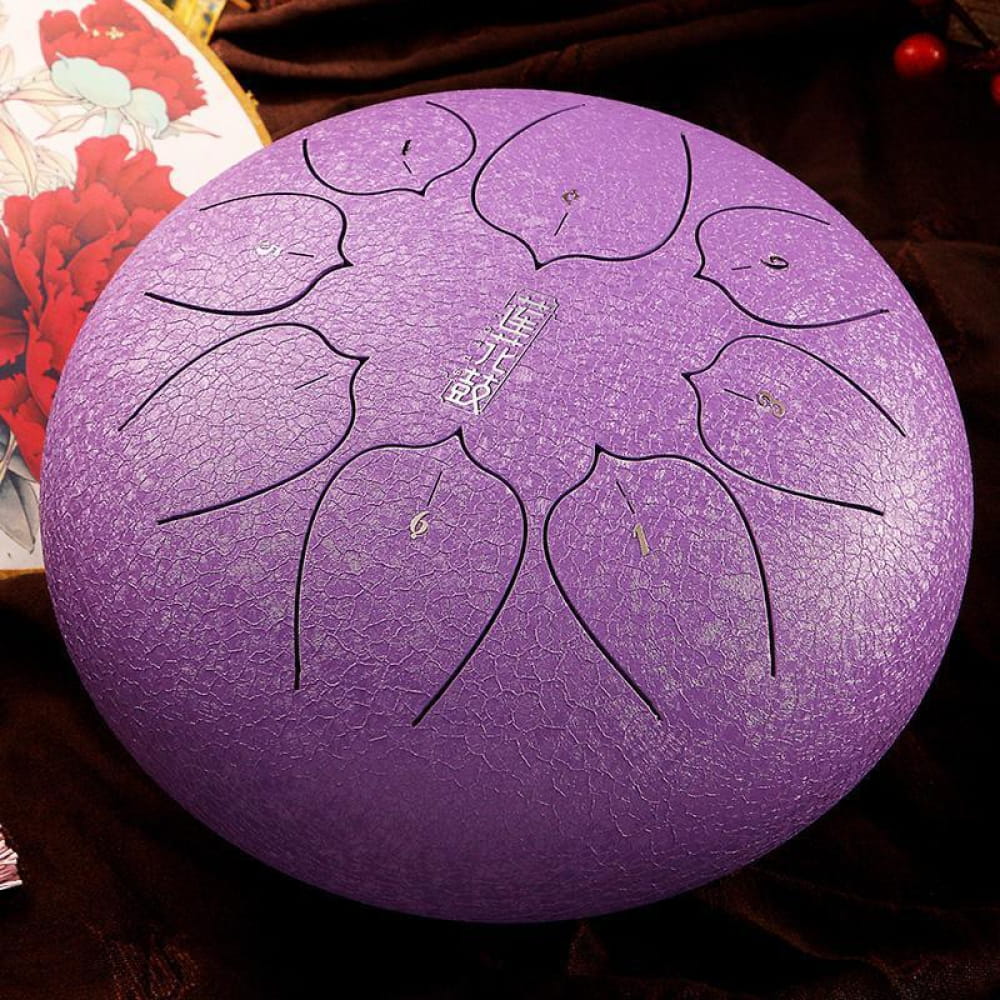 Purple Carbon Steel Tongue Drum with petal-shaped tone zones for portable music creation