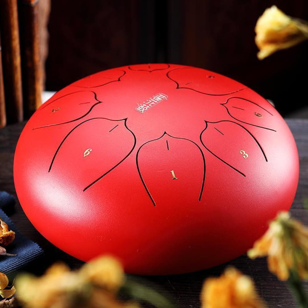 Red steel tongue drum with black patterns in 12 Carbon Steel Tongue Drum, 8 Tone C Key