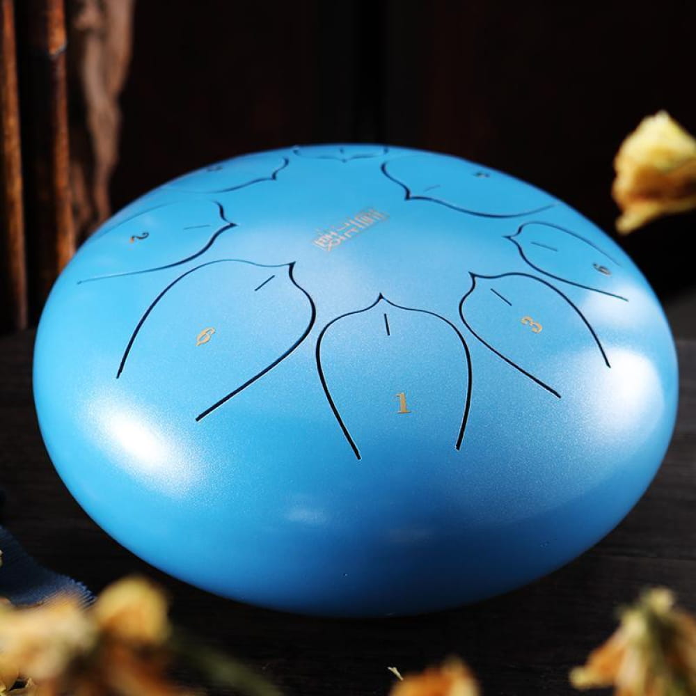 Light blue 12 inch Carbon Steel Tongue Drum with patterned tone markings, 8 tones in C key