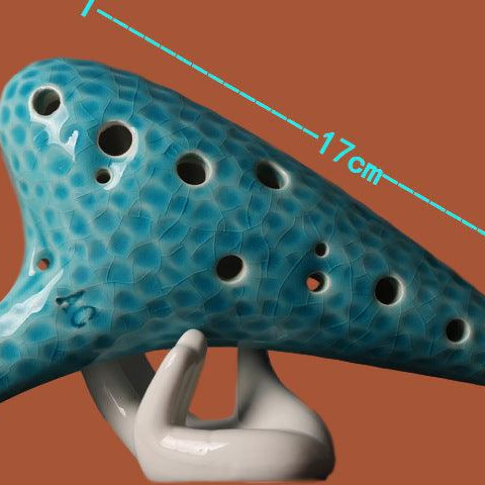 Turquoise 12 Hole Alto C Ceramic Ocarina with honeycomb pattern and finger holes