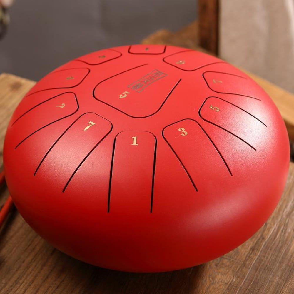 Red steel tongue drum with numbered sections for 12-Inch Carbon Steel Tongue Drum in C Key