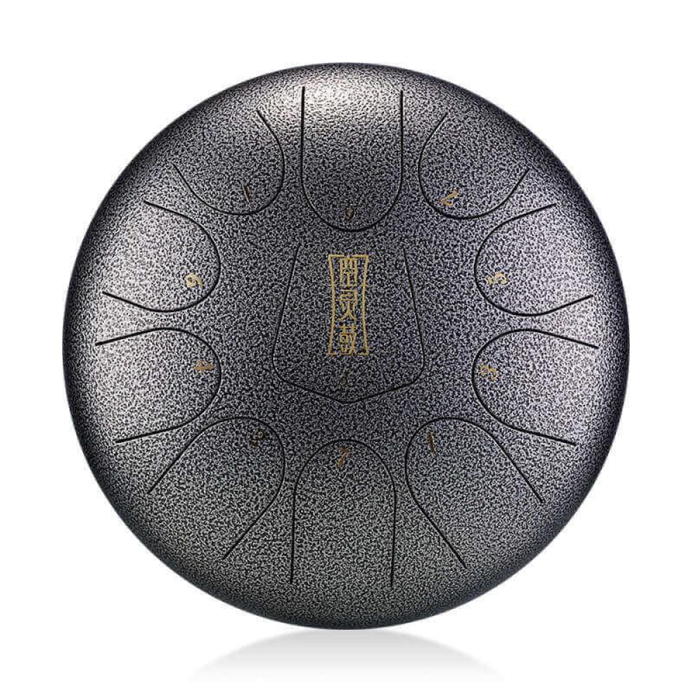 Metallic steel tongue drum with etched segments in circular pattern, 12-Inch F Key