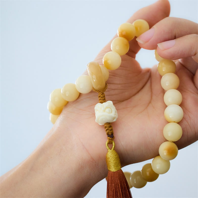 12mm Bodhi Seed Wrist Mala with Dancing Lion Charm for Harmony