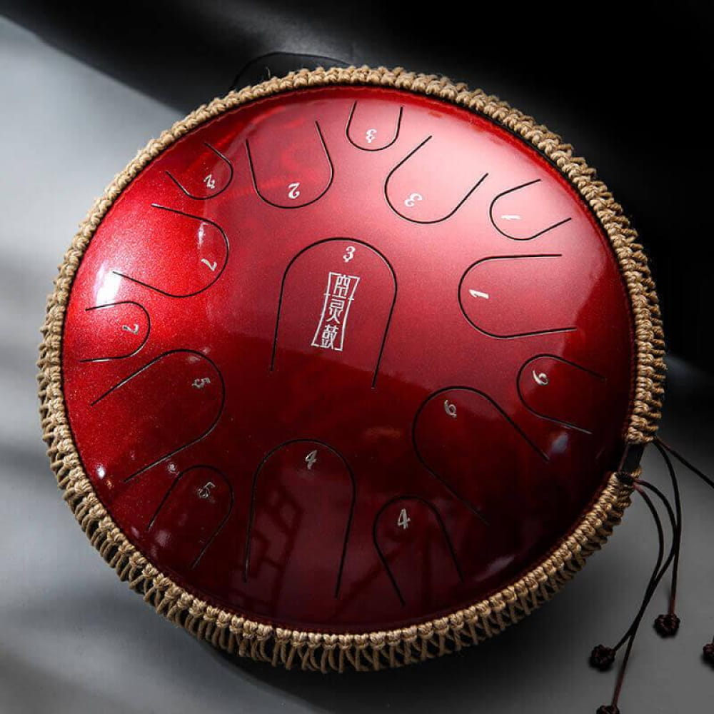 Red steel tongue drum with rope edges and tone markers in 13-Inch Titanium Steel Tongue Drum