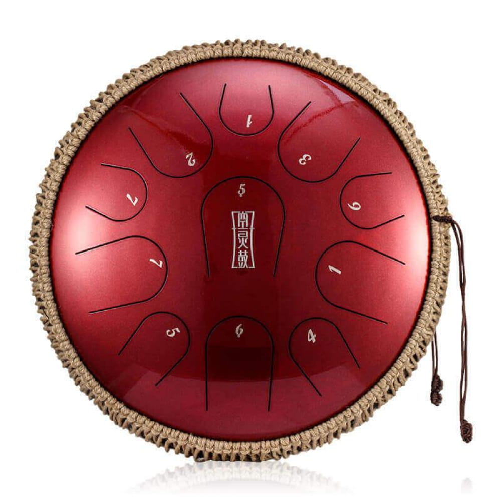 Red steel tongue drum with numbered tones and decorative trim, perfect for meditation