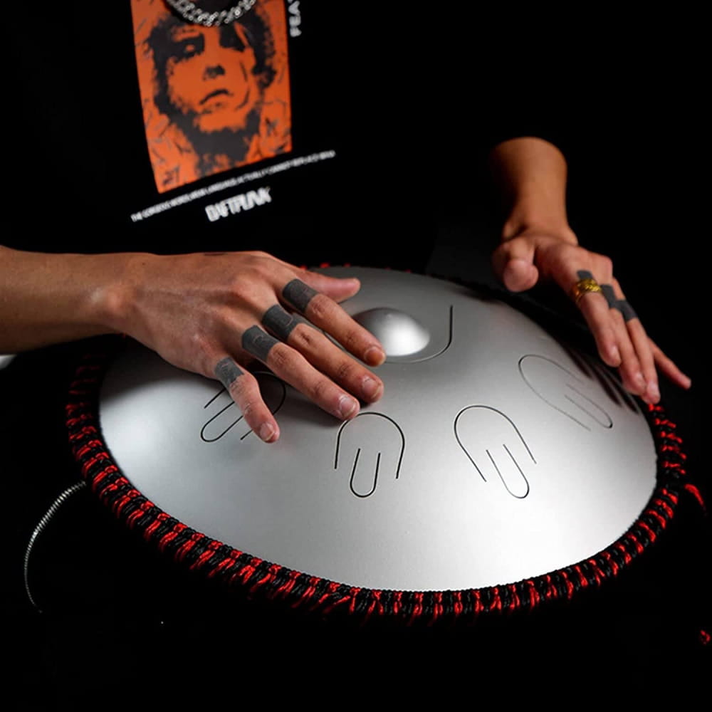 Steel tongue drum with red stitching, 14 Inch 9 Note D Minor Alloy design