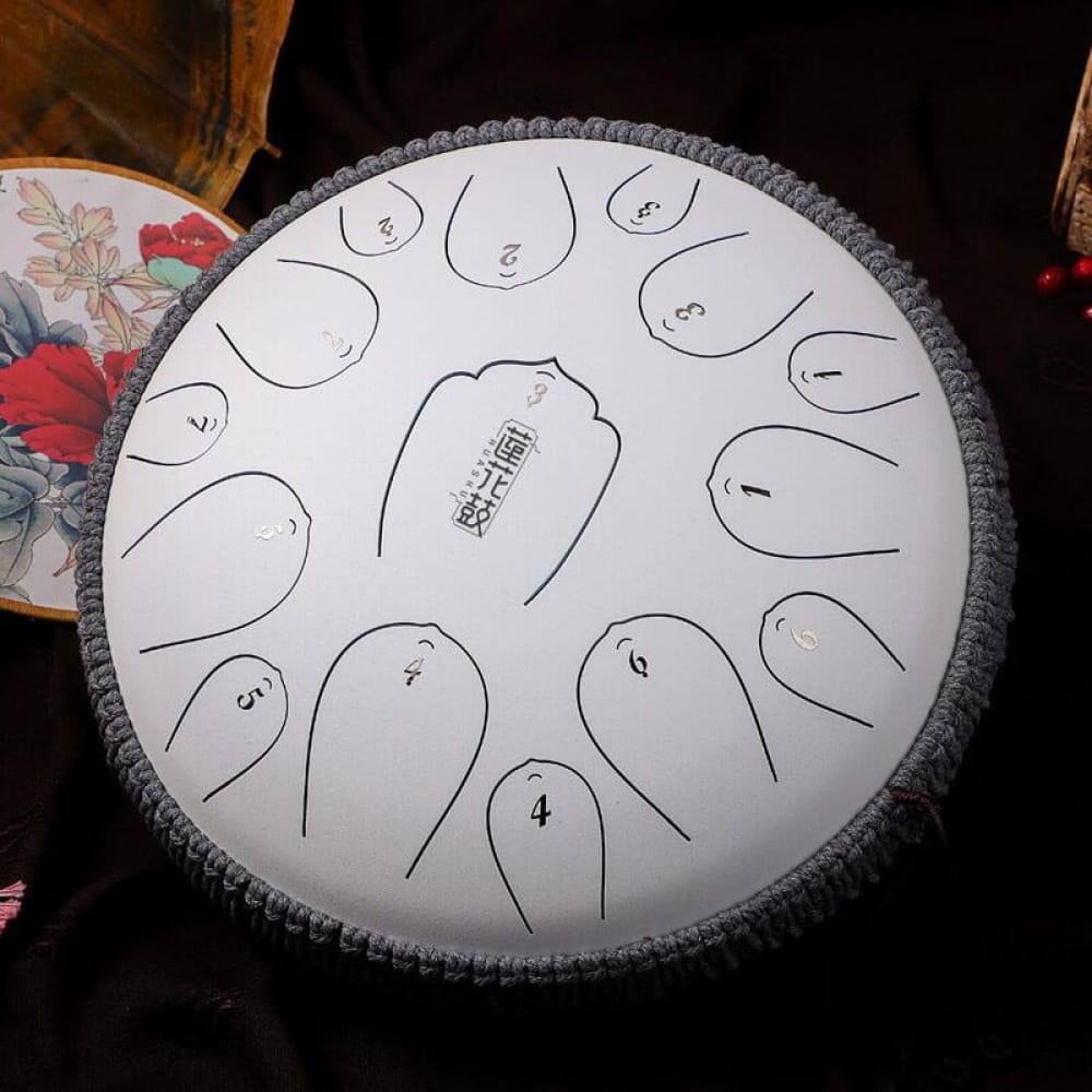 White steel tongue drum with numbered zones on 14-inch carbon steel D key instrument