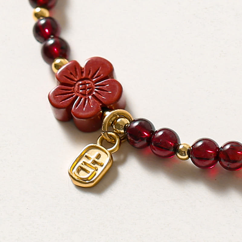 14K Gold Garnet Cinnabar Flower Calm Bracelet