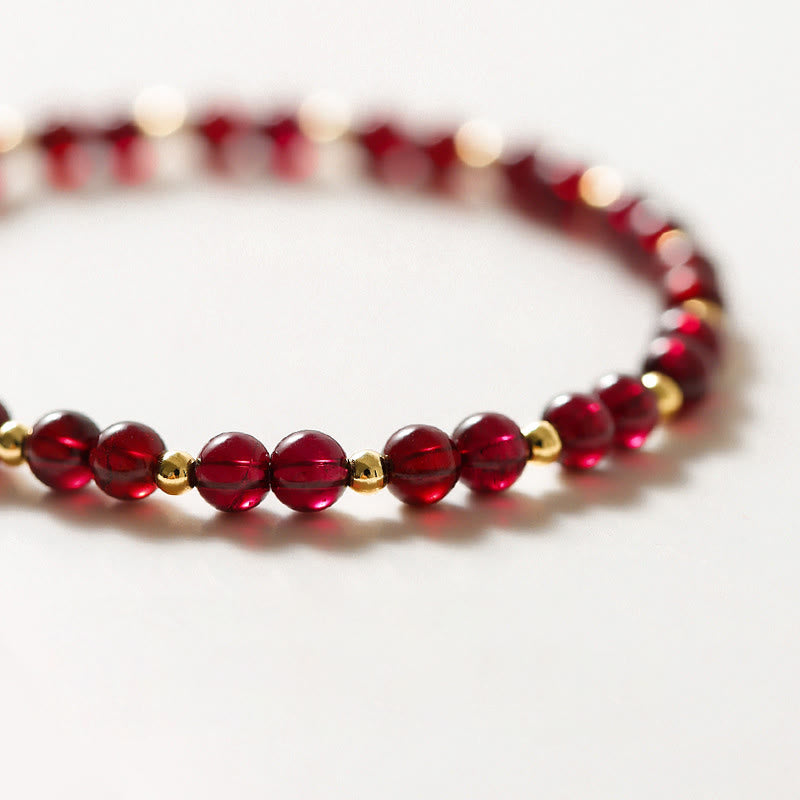 14K Gold Garnet Cinnabar Flower Calm Bracelet