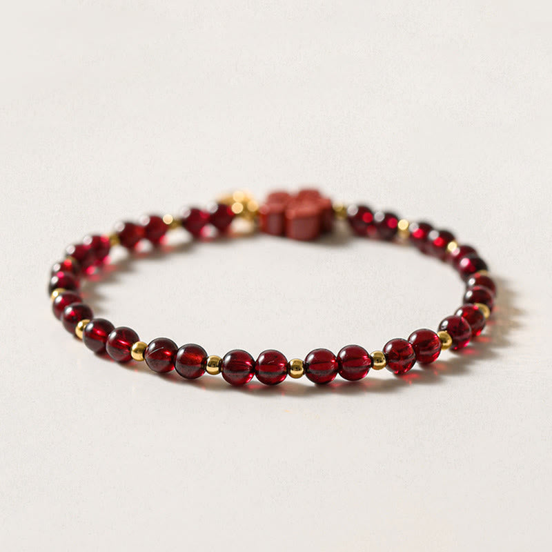 14K Gold Garnet Cinnabar Flower Calm Bracelet
