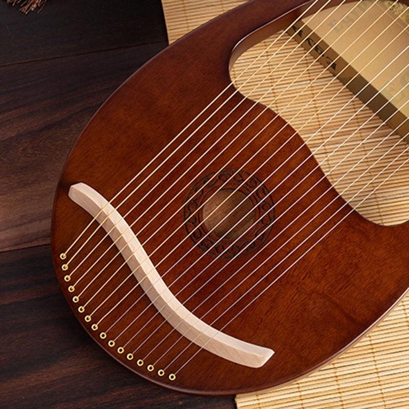 16 String Okoume Lyre Harp showcasing a wooden curved bridge and parallel strings