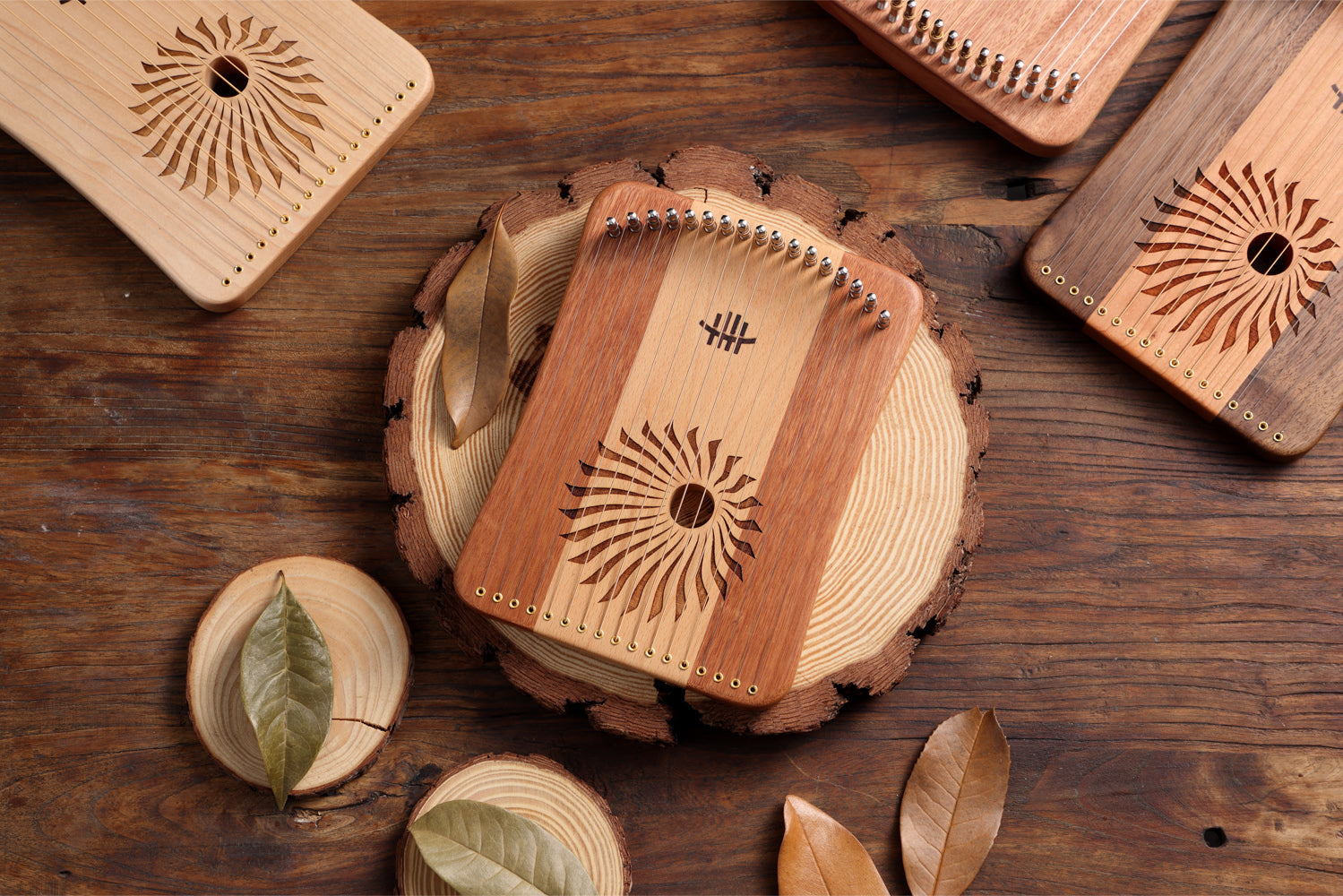 Wooden coaster with sun-like design on 17/31 String Wood Lyre Harp Instrument by Hluru