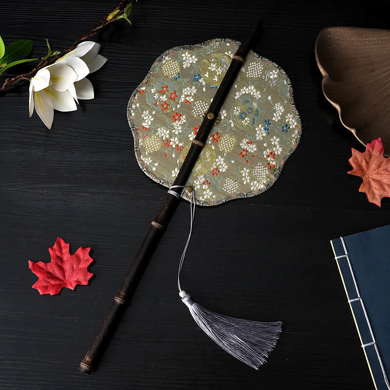 22cm Chinese Folding Fan with Purple Bamboo Handle and Floral Patterns