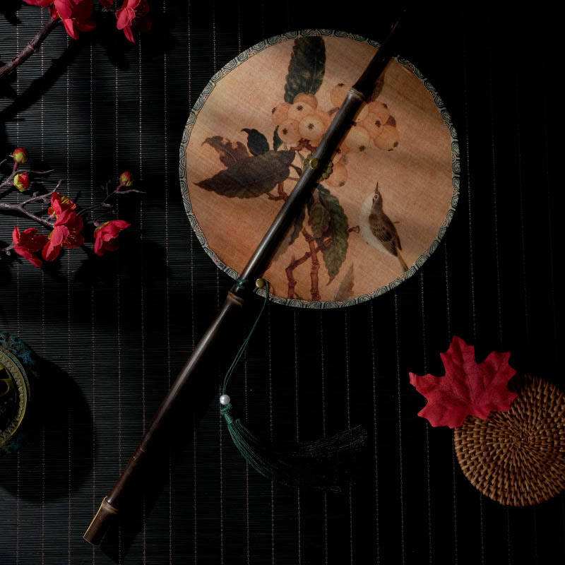 22cm Chinese Folding Fan with Purple Bamboo Handle and Floral Patterns