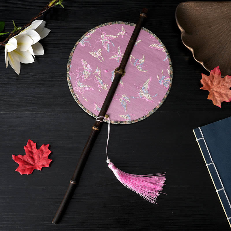 22cm Chinese Folding Fan with Purple Bamboo Handle and Floral Patterns