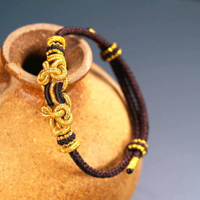 Unisex Red String Saddle Knot Strength Bracelet