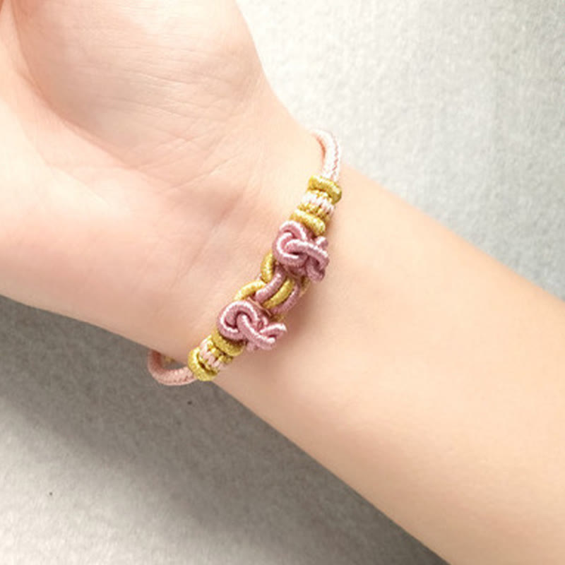 Unisex Red String Saddle Knot Strength Bracelet