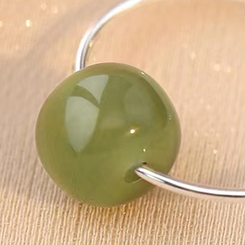 Sterling Silver Hetian Jade Earrings with Lucky Charm
