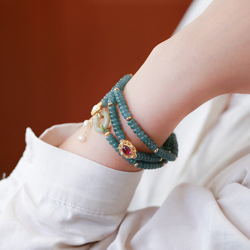 Cyan Jade Success Triple Wrap Bracelet with Silver Peace Buckle