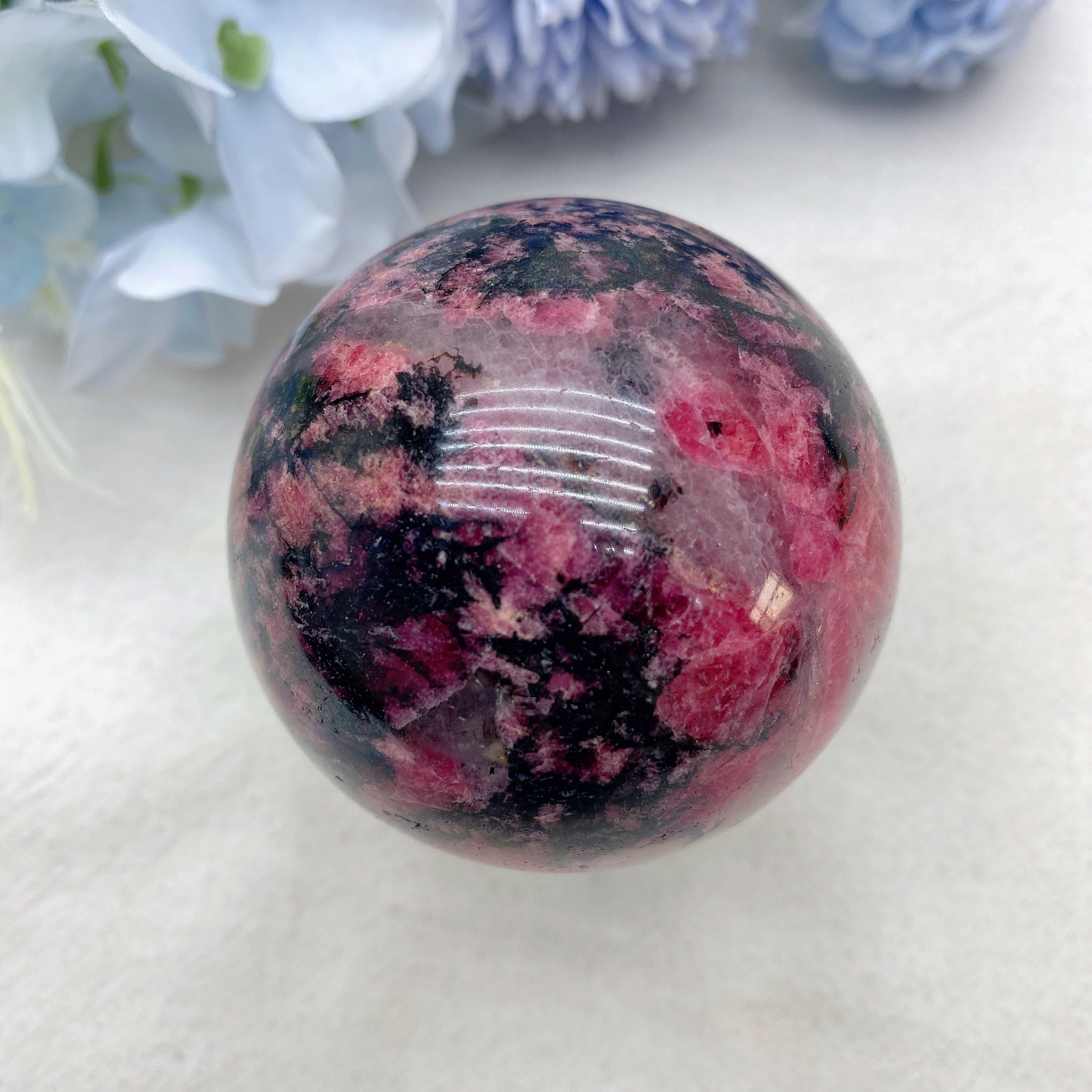 2.0-4.0" Rhodonite Crystal Sphere for Healing and Energy Balance