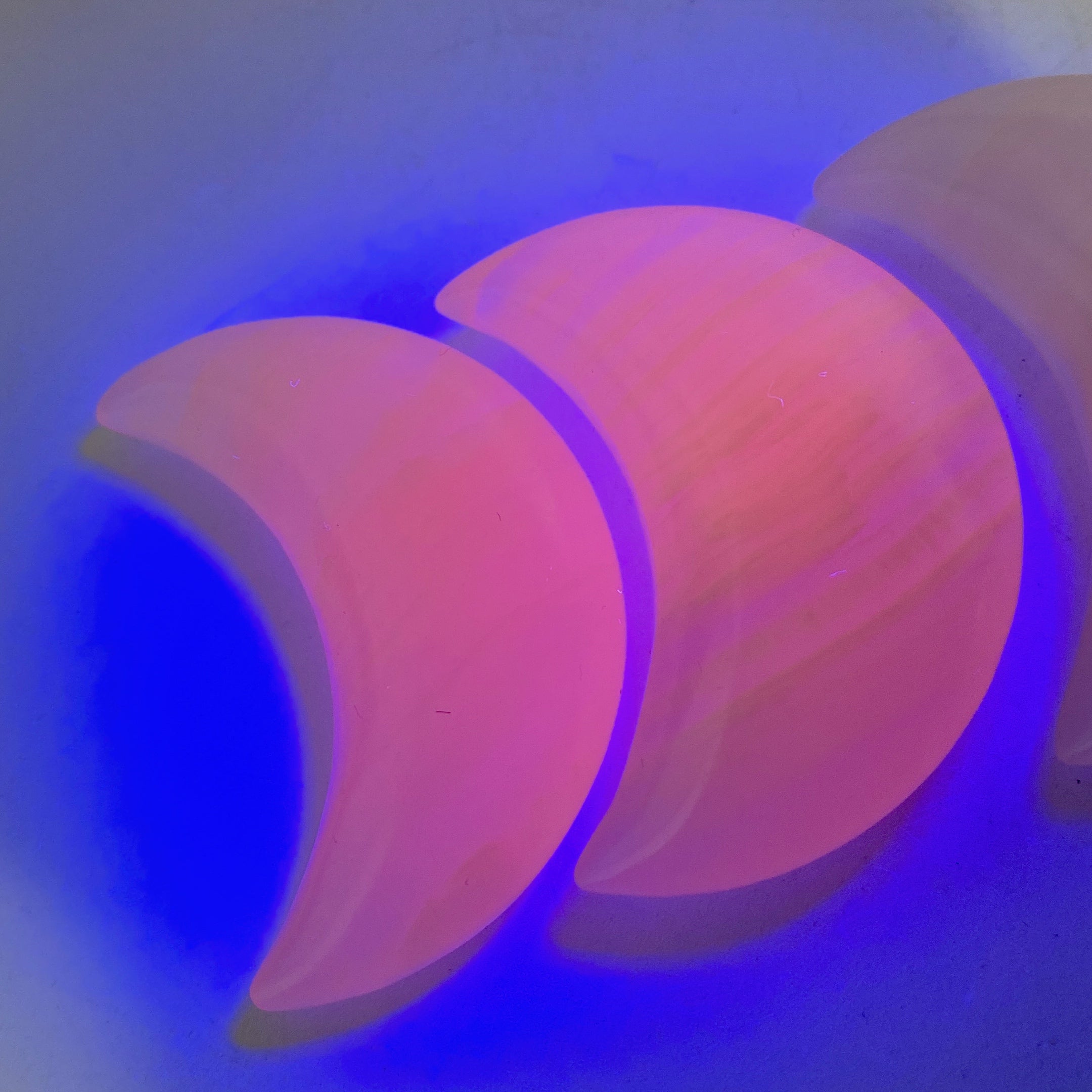 2.2-2.4in UV Reactive Pink Calcite Healing Palm Stone Trio