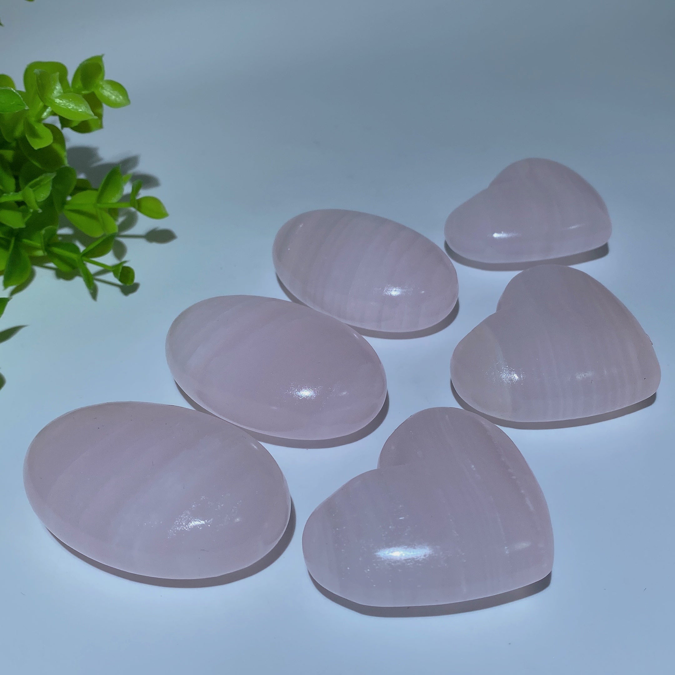 2.2-2.4in UV Reactive Pink Calcite Healing Palm Stone Trio
