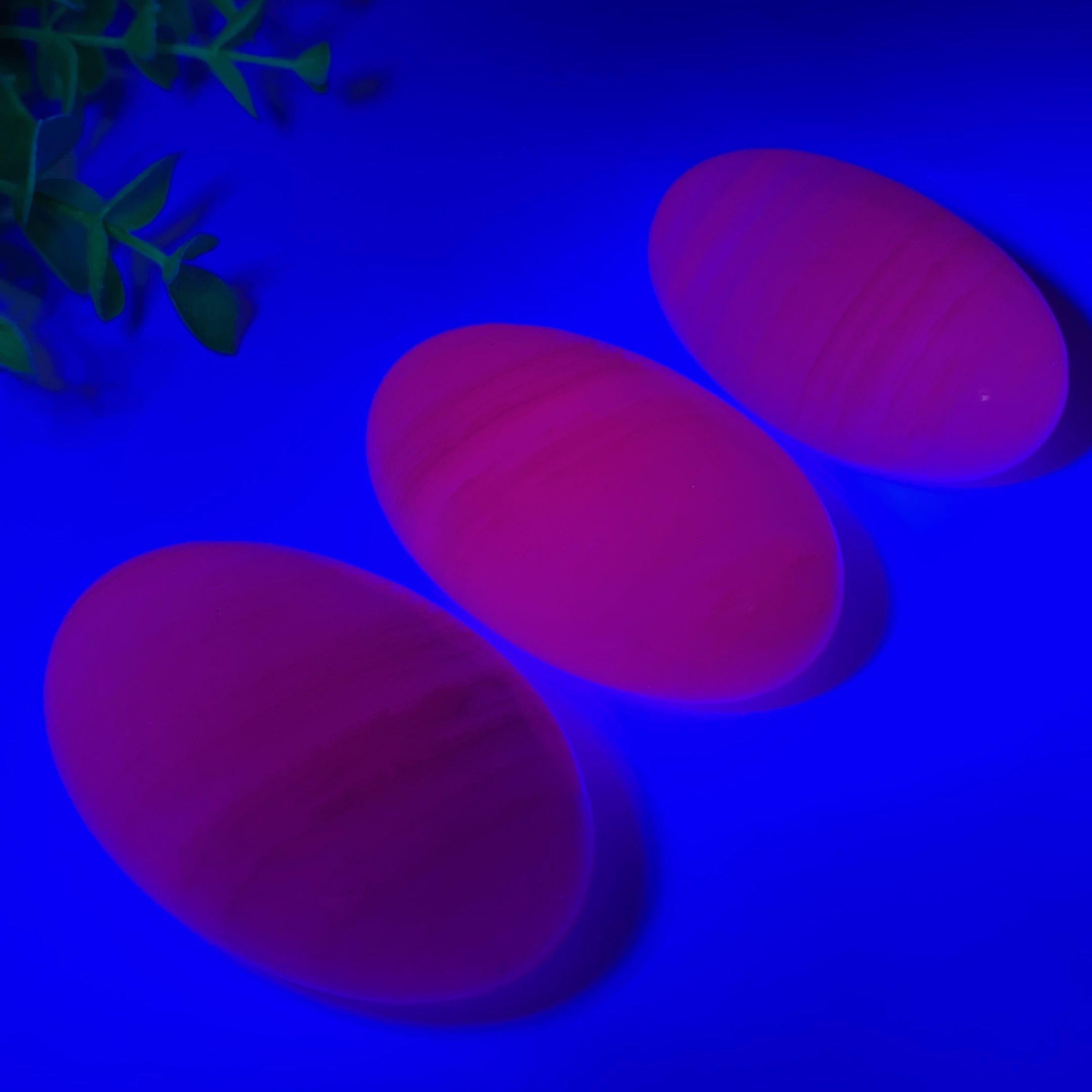 2.2-2.4in UV Reactive Pink Calcite Healing Palm Stone Trio