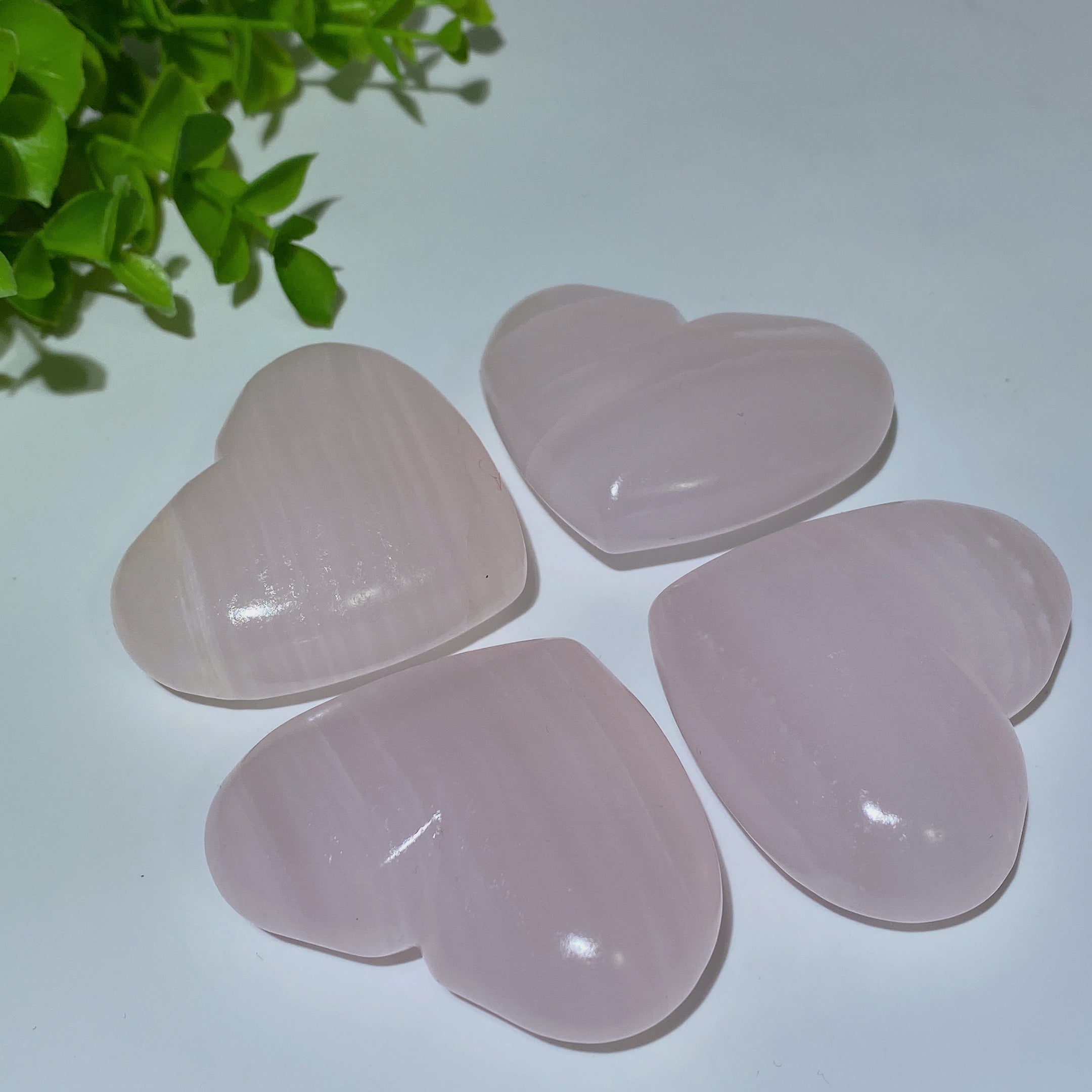 2.2-2.4in UV Reactive Pink Calcite Healing Palm Stone Trio
