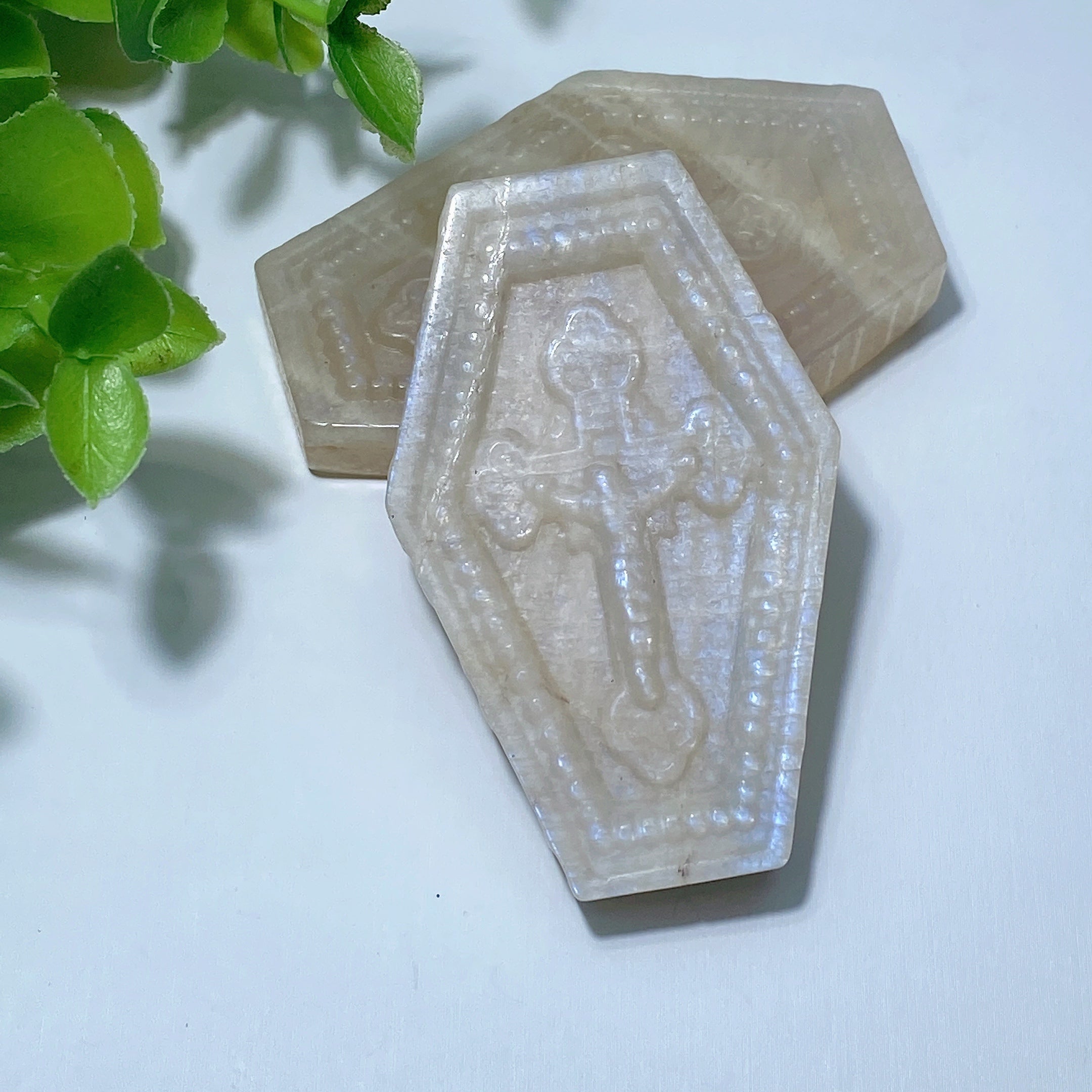 2.27 inch Peach Moonstone Coffin Crystal Carving
