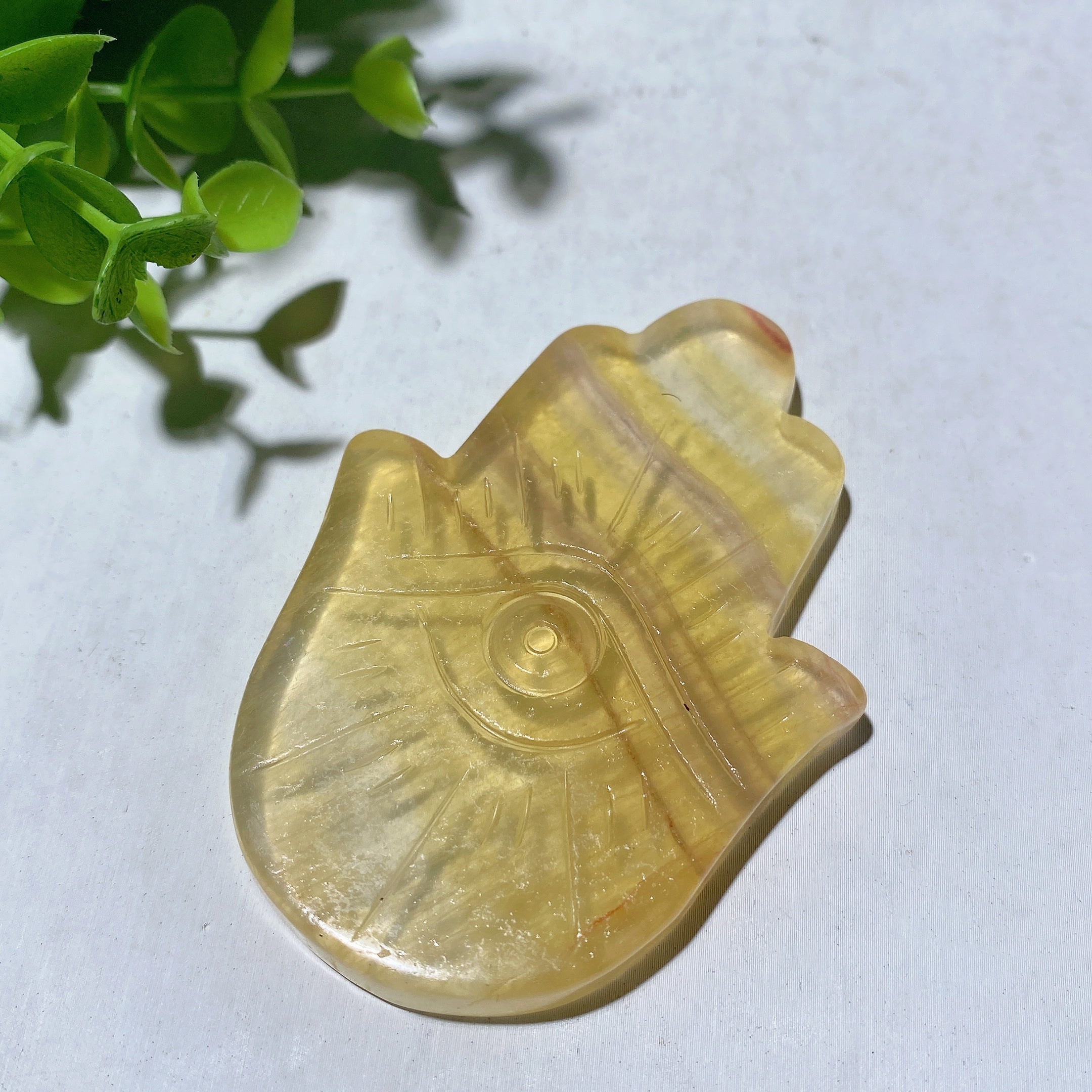 2.7 Inch Fluorite Hand Figurine with Horus Eye Carvings