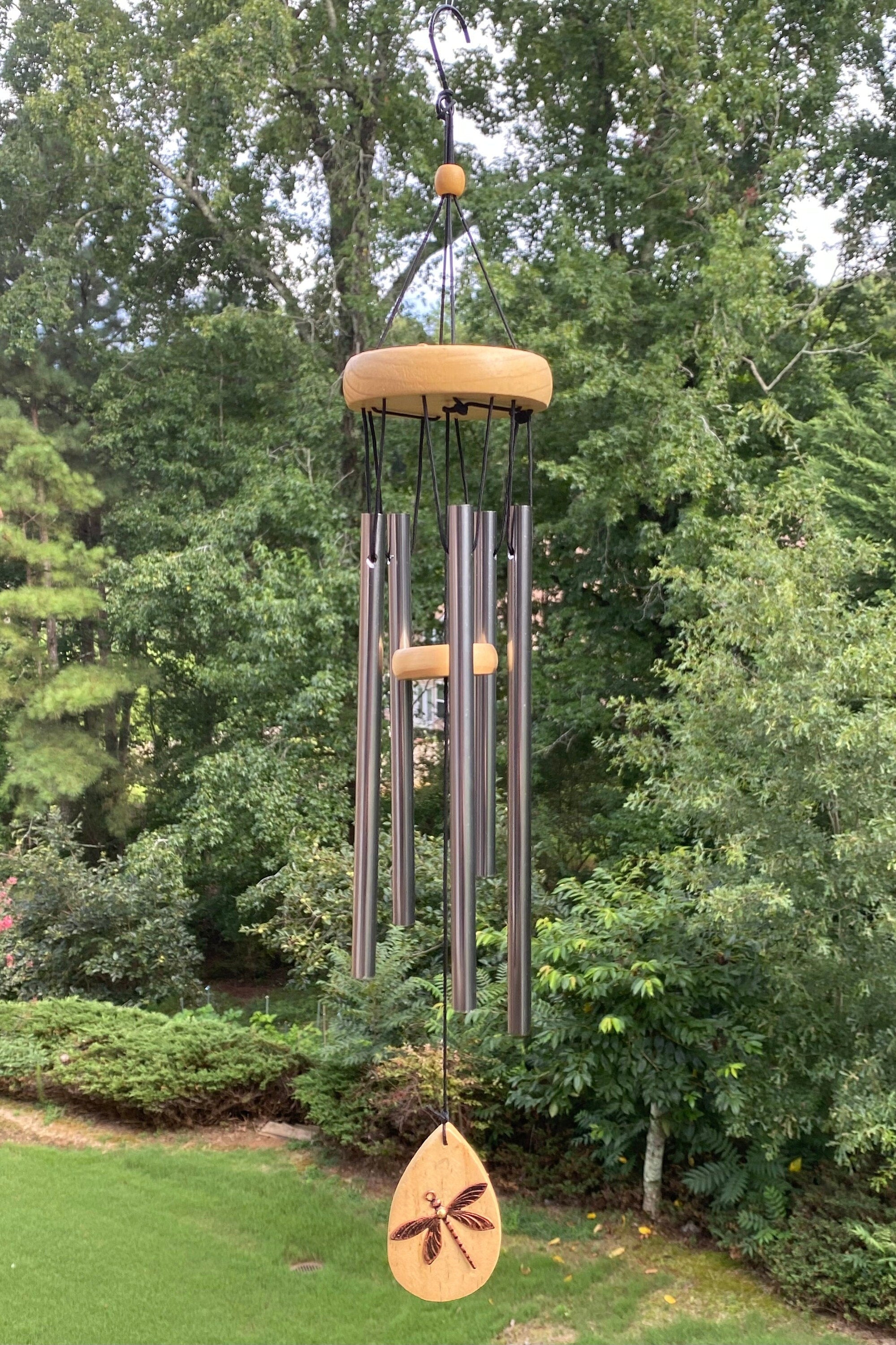Elegant 21 inch Dragonfly Memorial Wind Chime with metal tubes and wooden accents outdoors