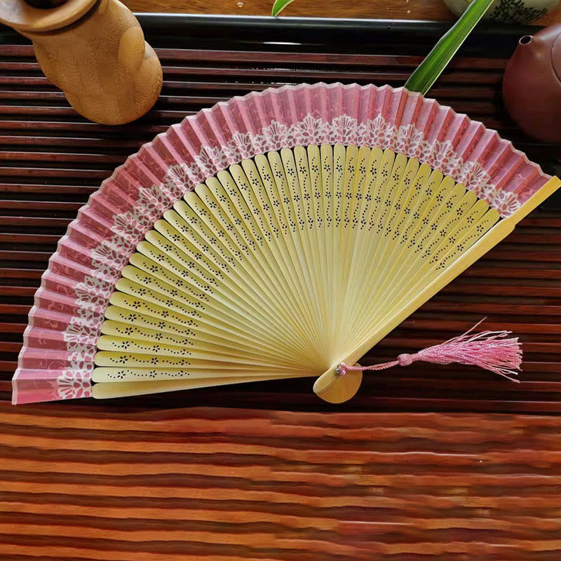 22cm Bamboo Folding Fan with Hollow Engraved Design | Tranquil Comfort