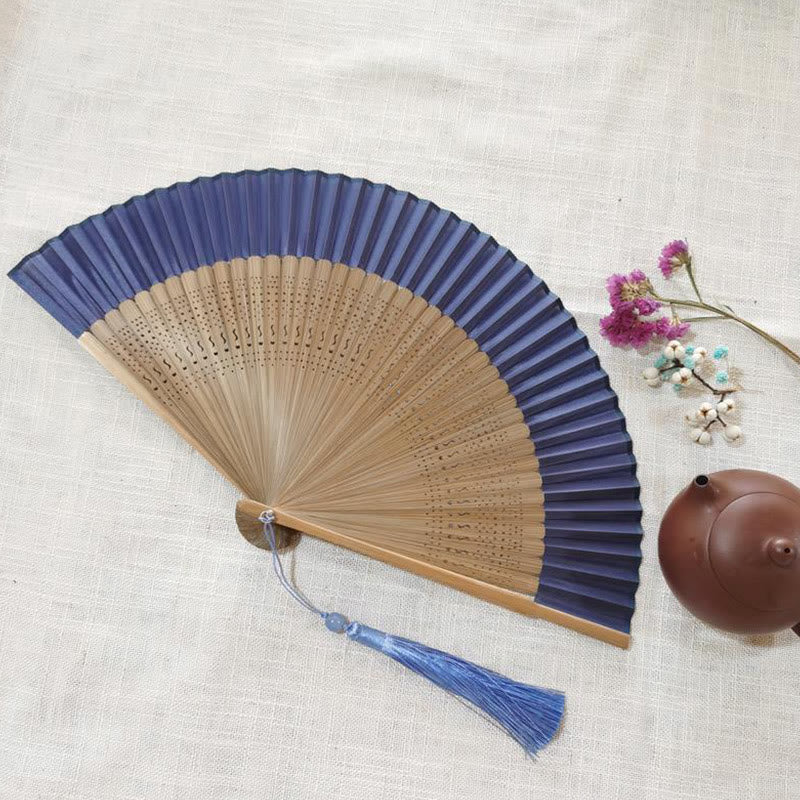 22cm Bamboo Folding Fan with Hollow Engraved Design | Tranquil Comfort