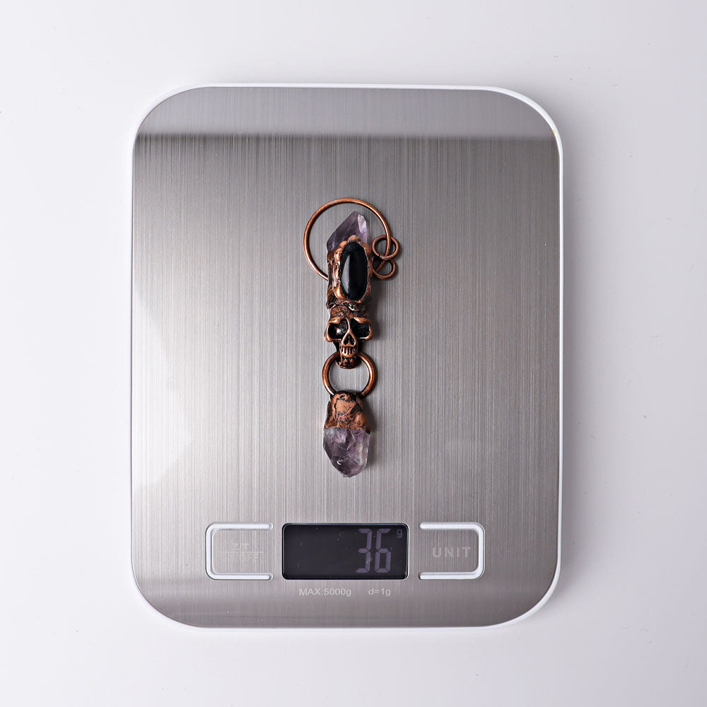 3.3 inch Amethyst Black Obsidian Skull Pendant