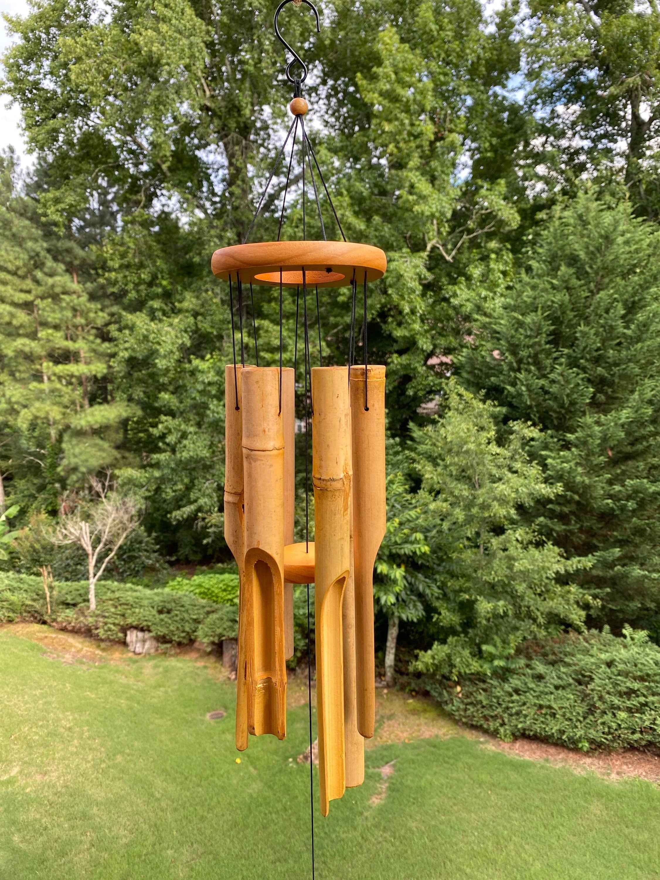 Wooden bamboo wind chimes with orange top for relaxation and tranquility in any space