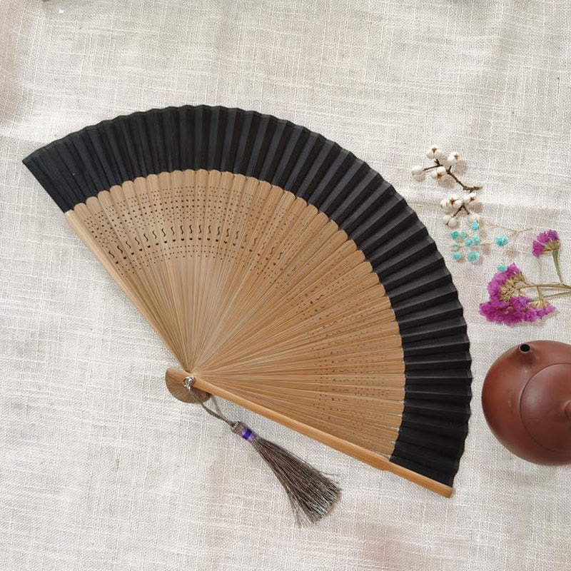 22cm Bamboo Folding Fan with Hollow Engraved Design | Tranquil Comfort