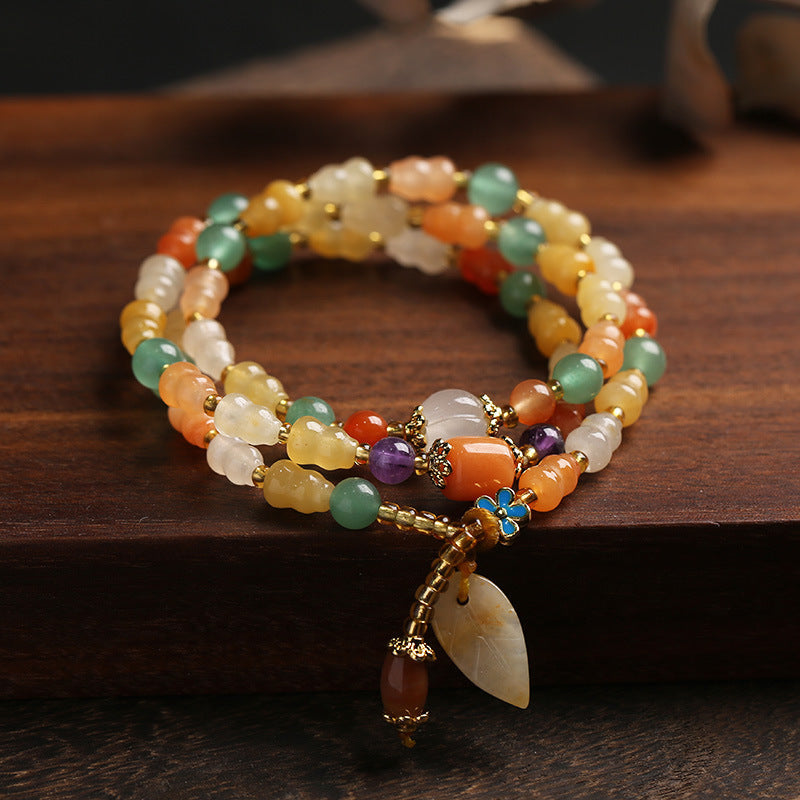Golden Silk Jade Gourd Wealth Bracelet 10mm Unisex