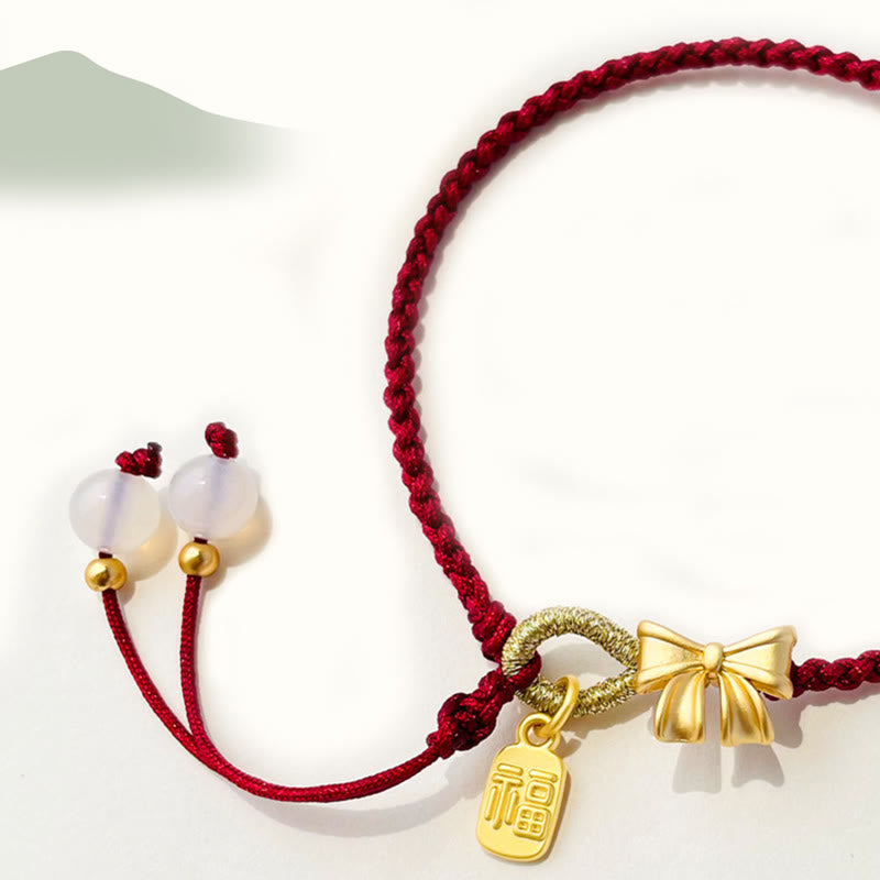 Red String Bracelet with Fu Character Charm and Peach Blossom Detail