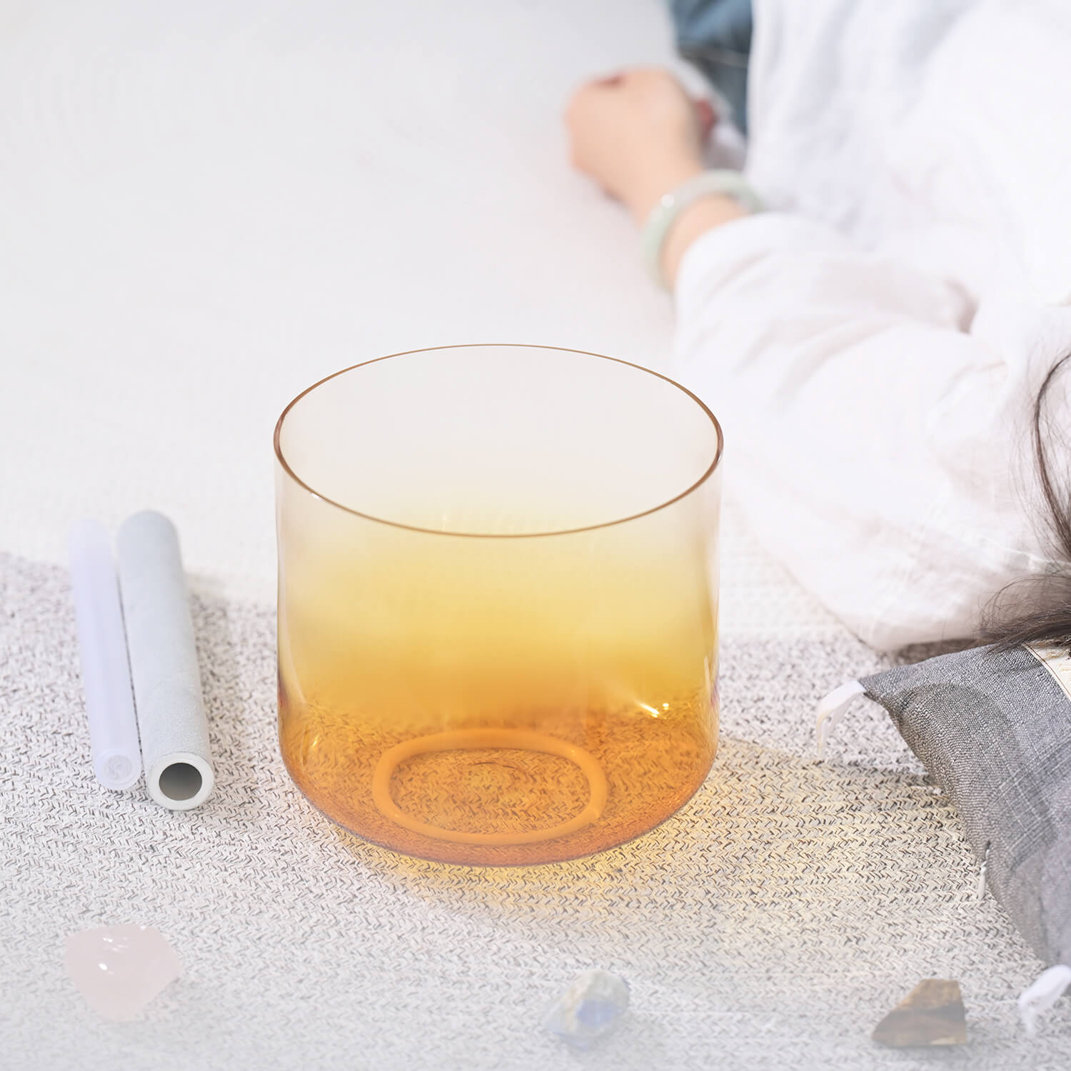 Amber-colored glass tumbler with a gradient effect for Quartz Crystal Singing Bowl