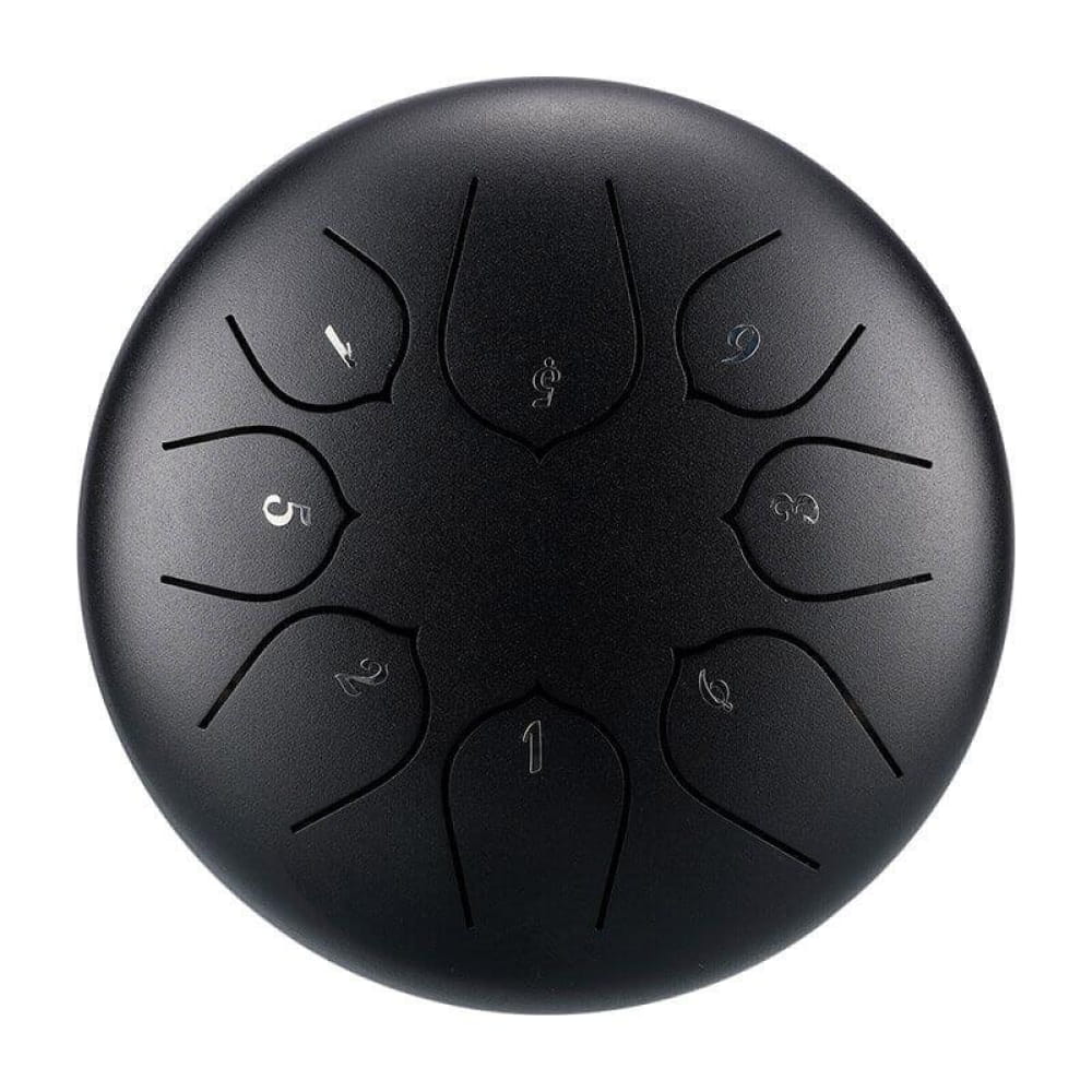Black steel tongue drum with eight tonal sections in C key for melodic music making