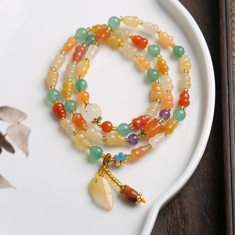 Golden Silk Jade Gourd Wealth Bracelet 10mm Unisex