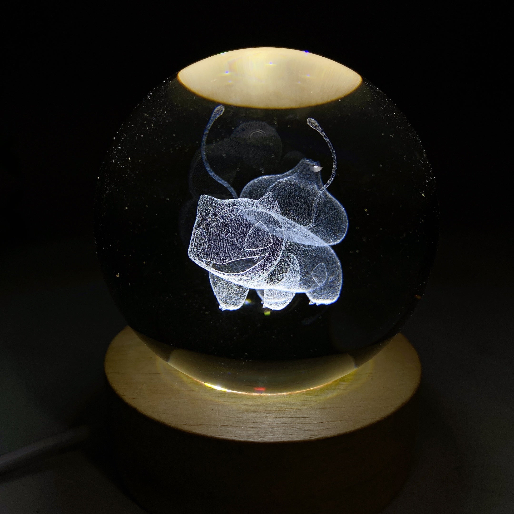 6cm Crystal Sphere with 3D Inner Carving of Cartoon Characters