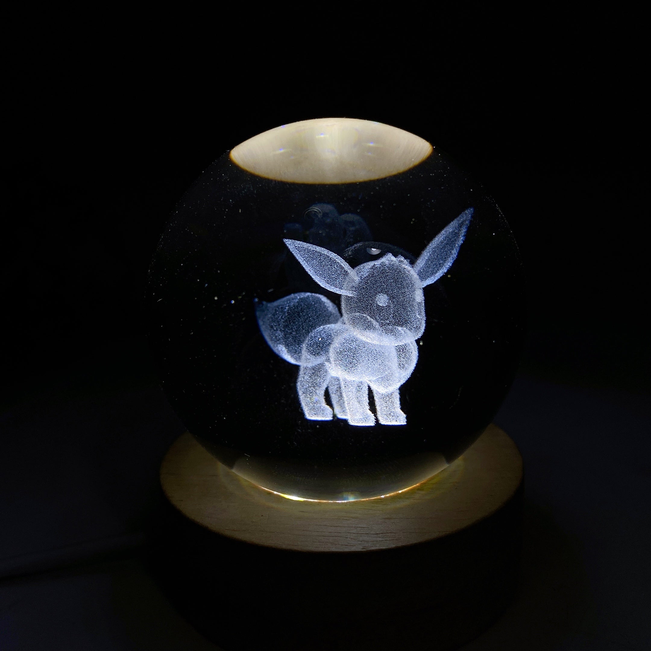 6cm Crystal Sphere with 3D Inner Carving of Cartoon Characters